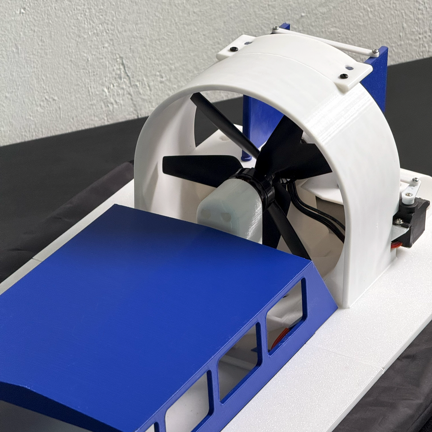 Amphibious Simulated RCHovercraft Model with Coaxial Contra-Rotating Design